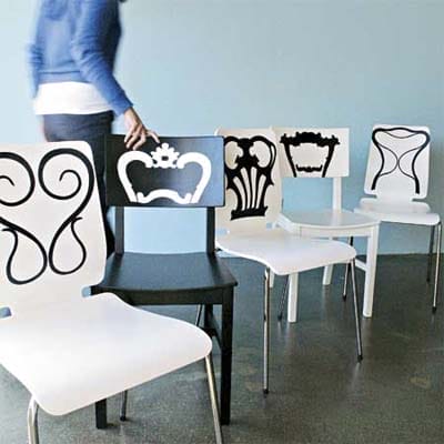 Five black and white chairs