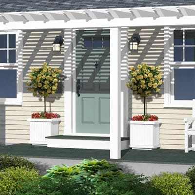 Matching vinyl planters with flower shrubs.
