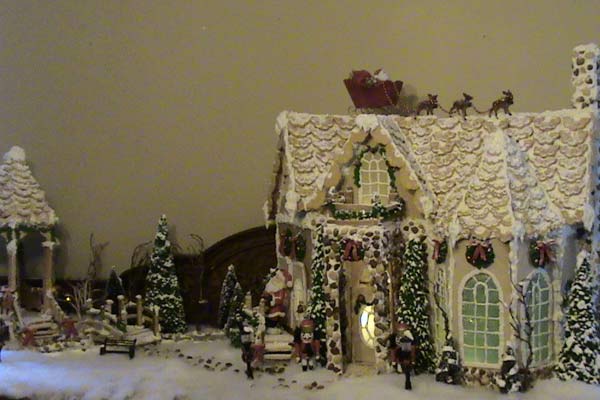 A gingerbread house titled "Home for Christmas"