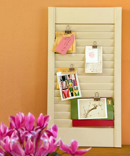 A shutter with notes pinned to it