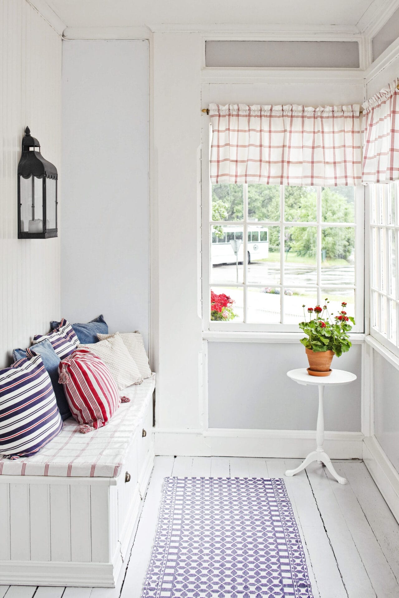 a built-in bench in a cottage-style interior of a home