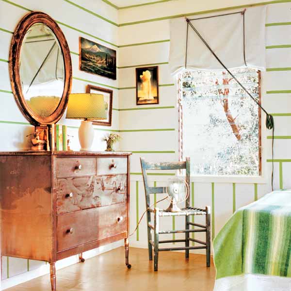 A room with green striped walls