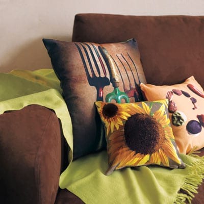 Throw pillows with printed photos on them