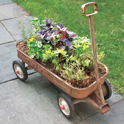 A wagon used as a herb planter