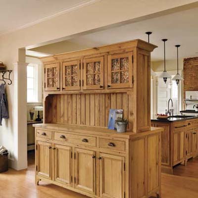 a hutch within a kitchen with lots of storage options