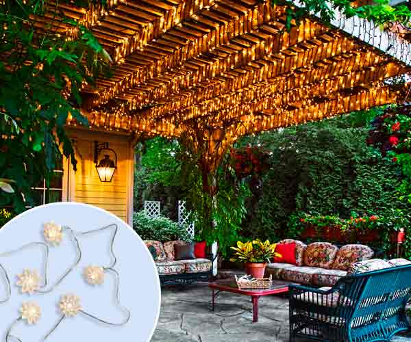 A pergola wrapped in string lights