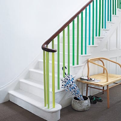 A staircase with blue and green paint