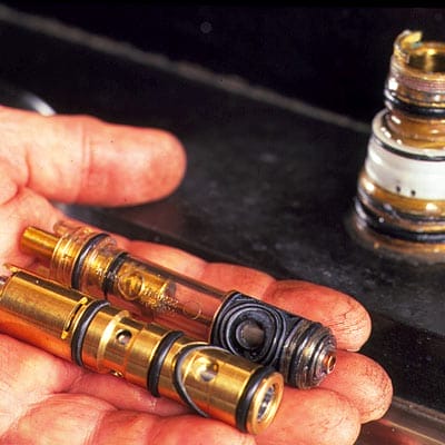 Replacement cartridges for a dripping faucet