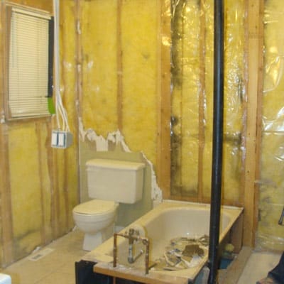 A partially demolished bathroom