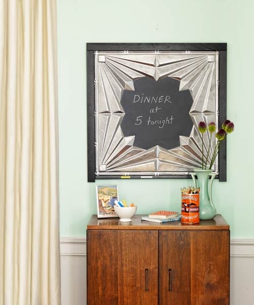 A tin tile chalkboard with a message