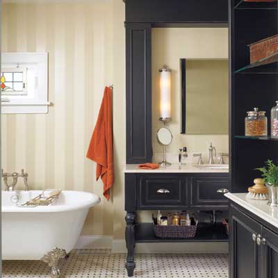 Elegant gentleman's bathroom with painted stripe walls and marble flooring.