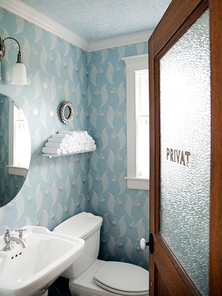 Window film is used to create privacy glass for a bathroom.