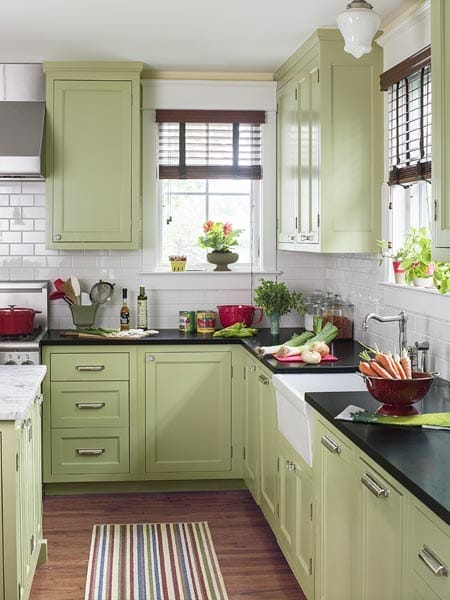 A view of the cabinets and counters in the green kitchen