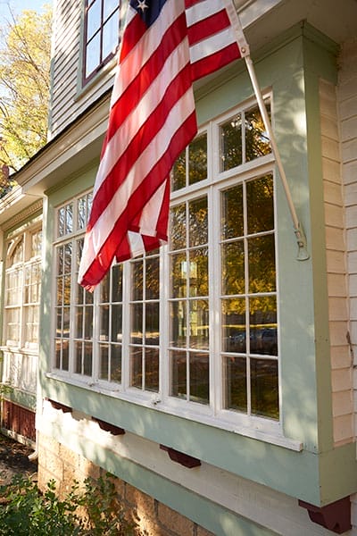 Glass windows on the front of a house.