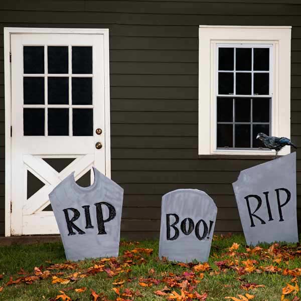 Ghostly graveyard tombstone Halloween decorations.