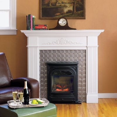 A tin-tile fireplace surround