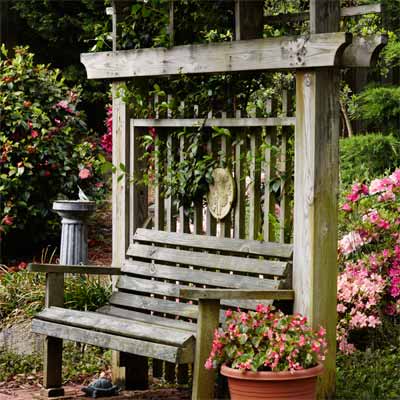 A wooden garden arbor