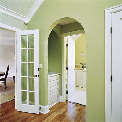A green room between the bedroom and bathroom