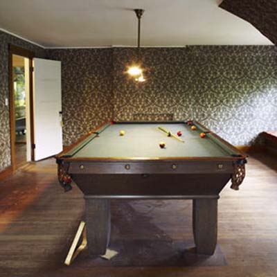 Third-floor billiards room.