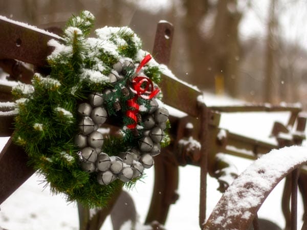 Image of an evergreen wreath used as a decoration for the holiday season. 