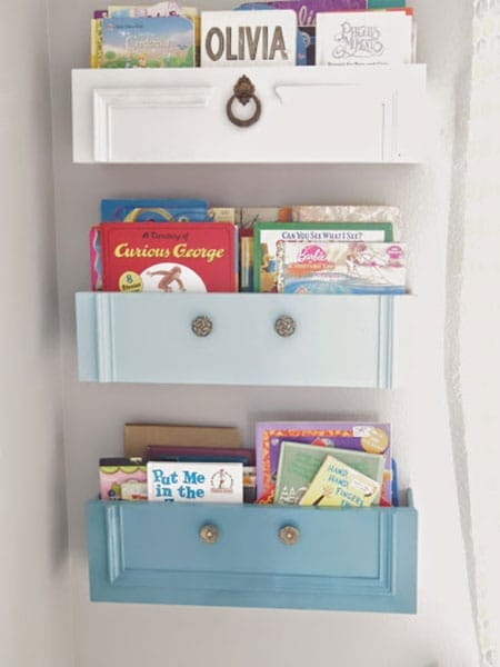 Three bookshelves holding children's books.