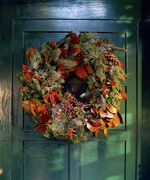 Image of crisp magnolia used to create a wreath, used as a decoration for the holiday season. 