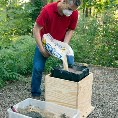 Step 14 for how to make a concrete planter, which involves installing the interior form