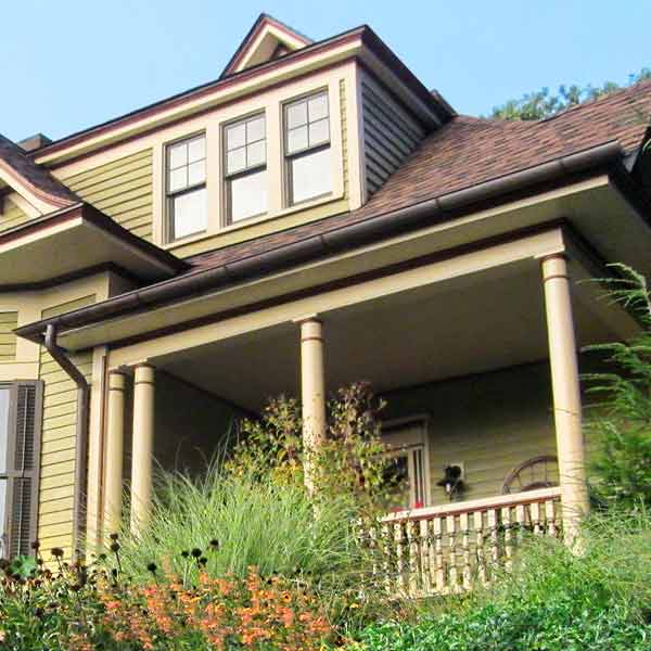 Copper half-round gutters on the Queen Anne house.
