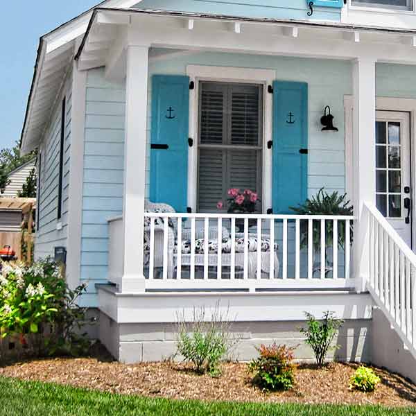 Close-up on porch details in blue color scheme.