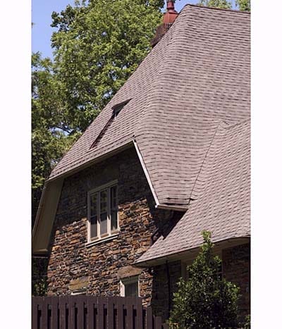Composition asphalt shingles on residential roof.