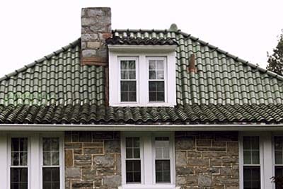 Modern Spanish tiles with integral drainage channels.