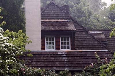 Wooden shingle roof.