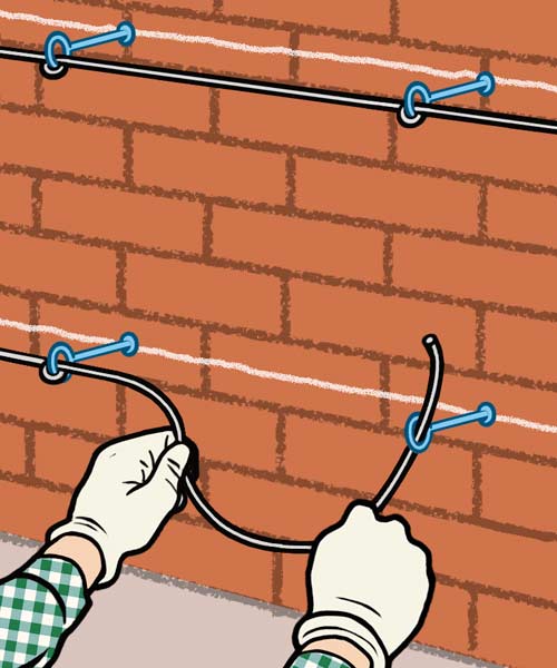 Diagram showing how to attach supports to a masonry wall.
