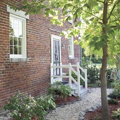 An exterior door on a brick house