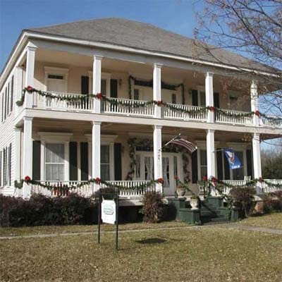 A two-story house in Louisiana with Christmas decorations