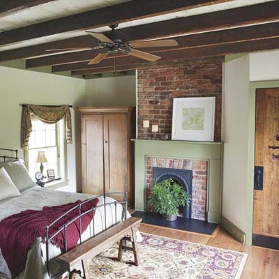 A master suite with ceiling beams