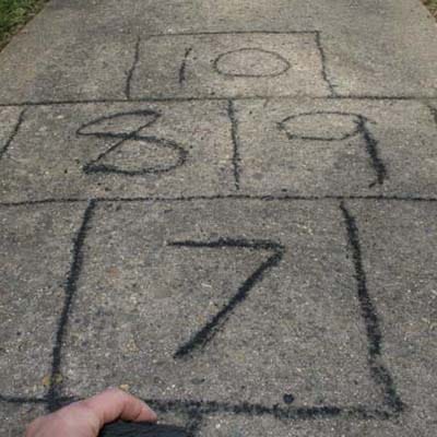 charcoal used to draw on a sidewalk
