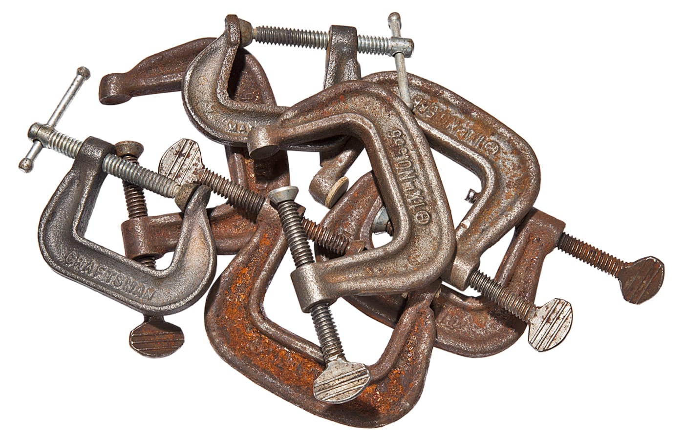 A pile of metal C-clamps