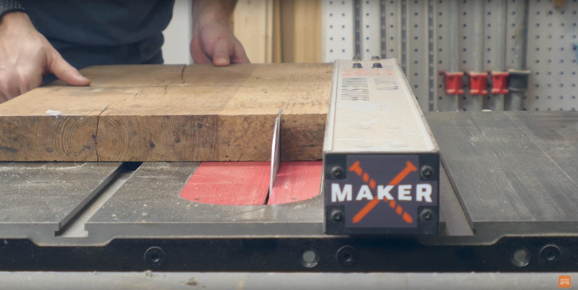 Image of someone demonstrating one of the steps of making an ocean epoxy table, which is to prepare the table legs and cross braces
