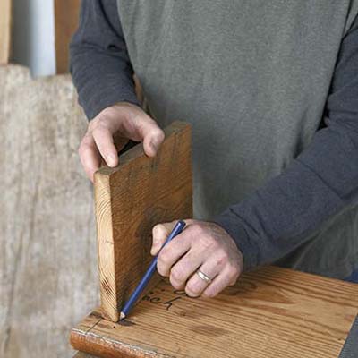A person arranges the apron board stair pieces.