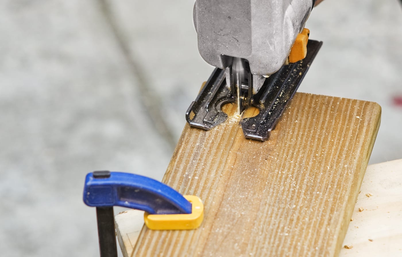 Floorboards are cut to be installed into the privacy planter.