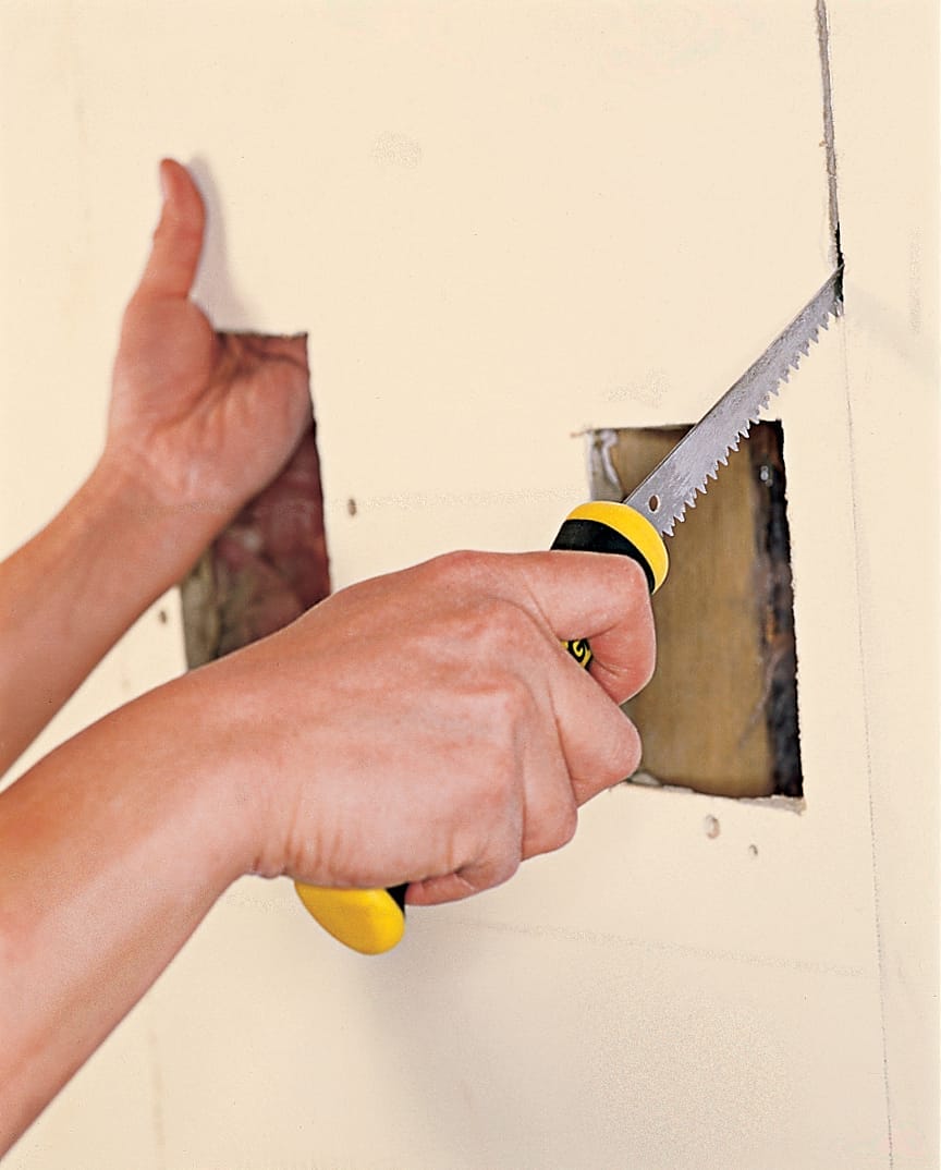 marking and cutting the opening for a medicine cabinet
