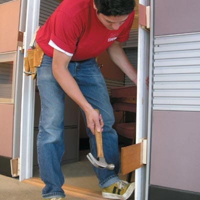 A man using a hammer