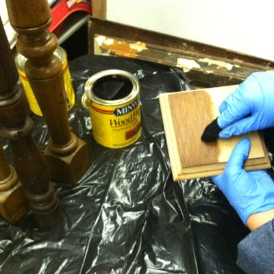 staining and sealing the base of the stair baluster