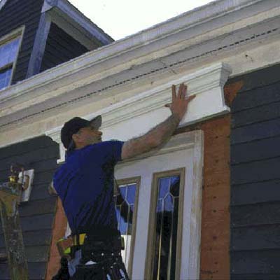 installing a crosshead pediment onto an entryway