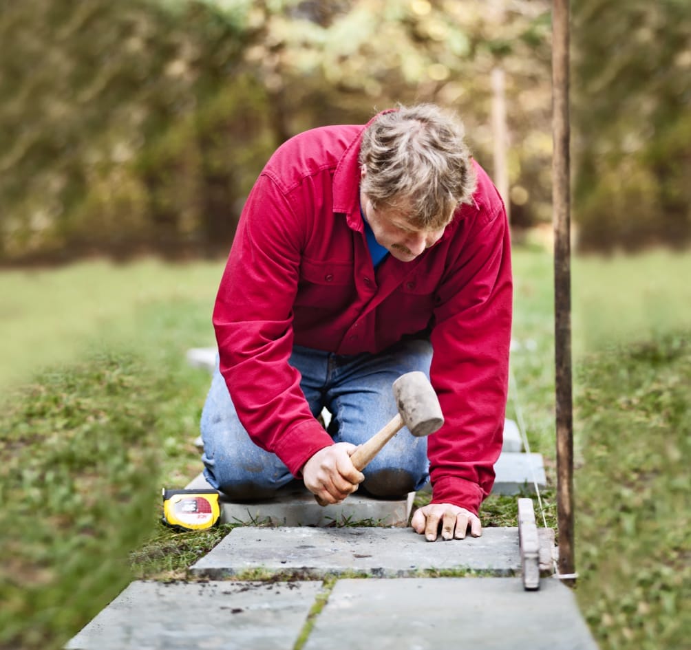 Placing and setting stones for the path