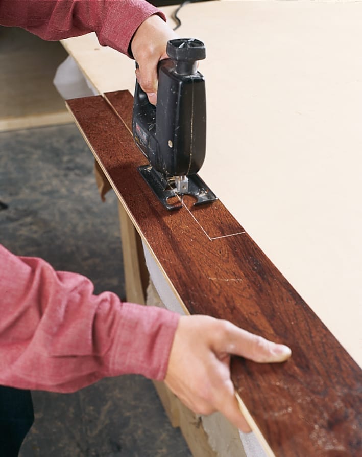 sawing transition strips for a floating floor and installing them