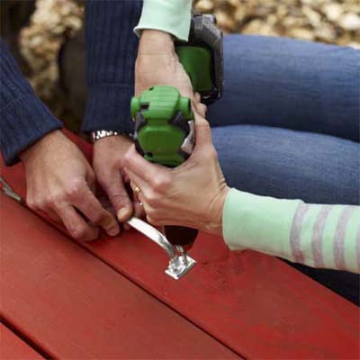 Mounting the hood ornament onto the sandbox