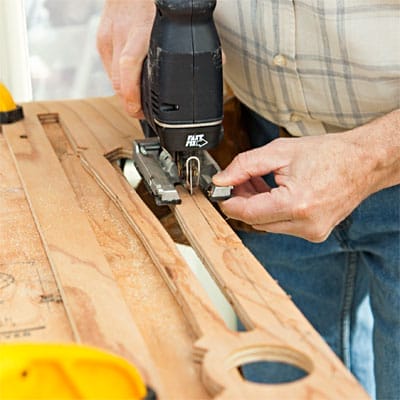 Jigsaw cutting wood to make a Gingerbread Balustrade