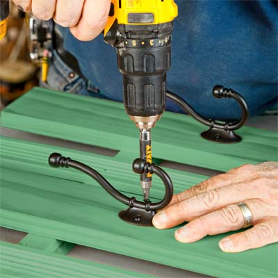 Drilling on the coat hooks. 